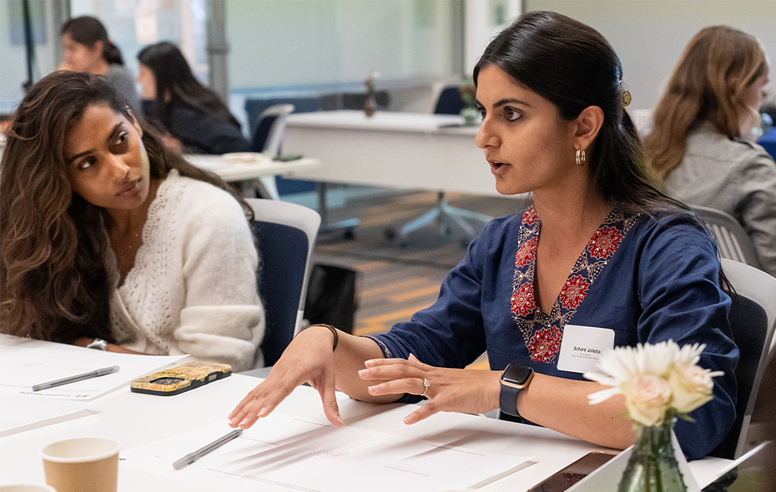 Participants of the Making Work Work for Women conference in discussion